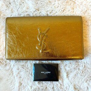 New without tags Yves Saint Laurent SAC Belle de Jour large gold metallic clutch
